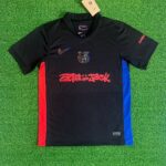 Barcelona x Travis Scott Away Jersey 2025/26 – Black with Cactus Jack red graffiti and red-blue side panels